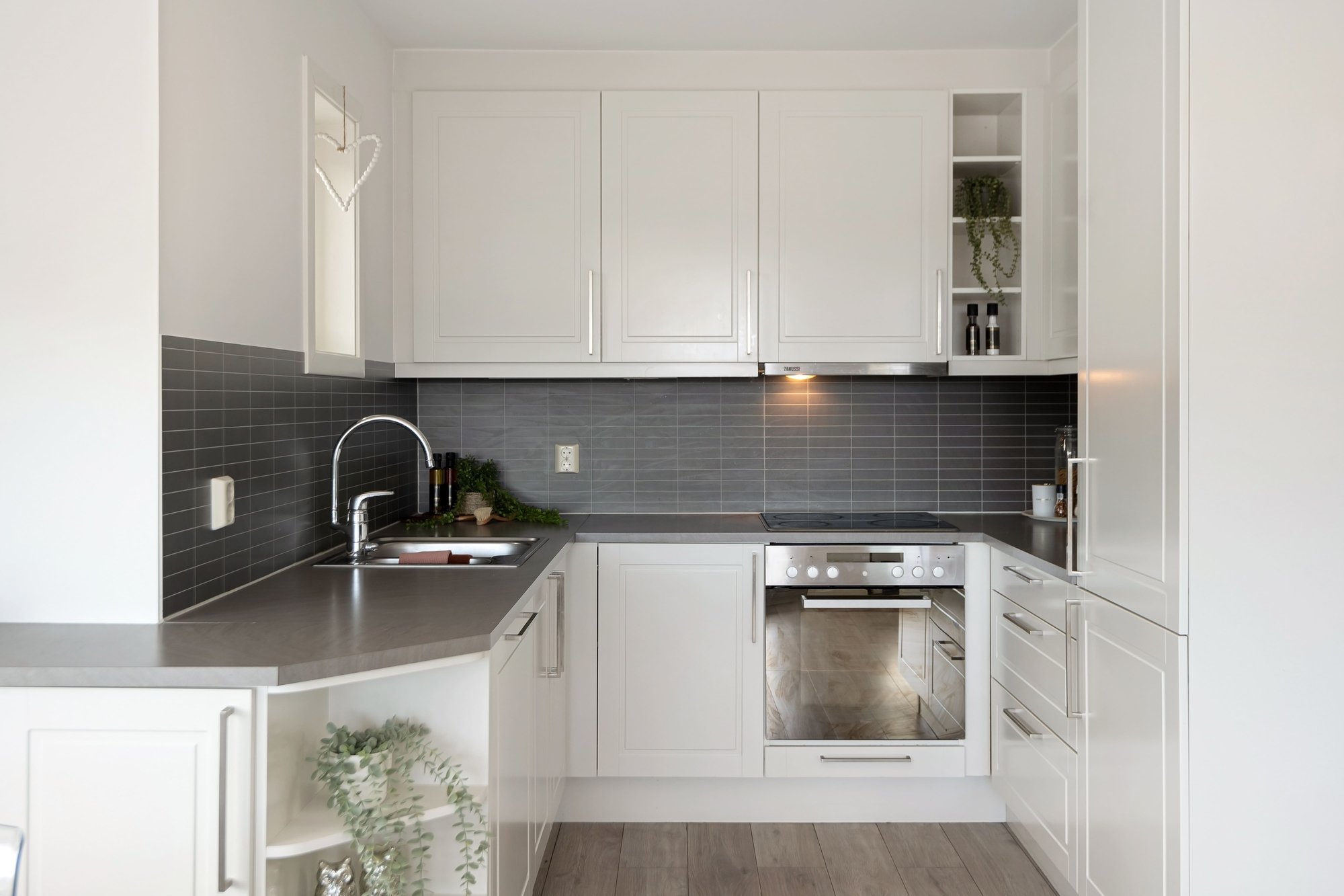 Clean and Modern Kitchen with Grey Accents in Accessory Dwelling Unit