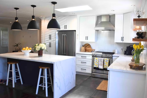 Waterfall Kitchen Island with Modern Pendant Lighting in Beautiful White Kitchen Accessory Dwelling Unit ADU